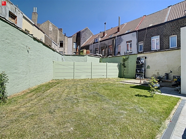 Ruime woning met uitzonderlijk grote stadstuin te huur in Gent